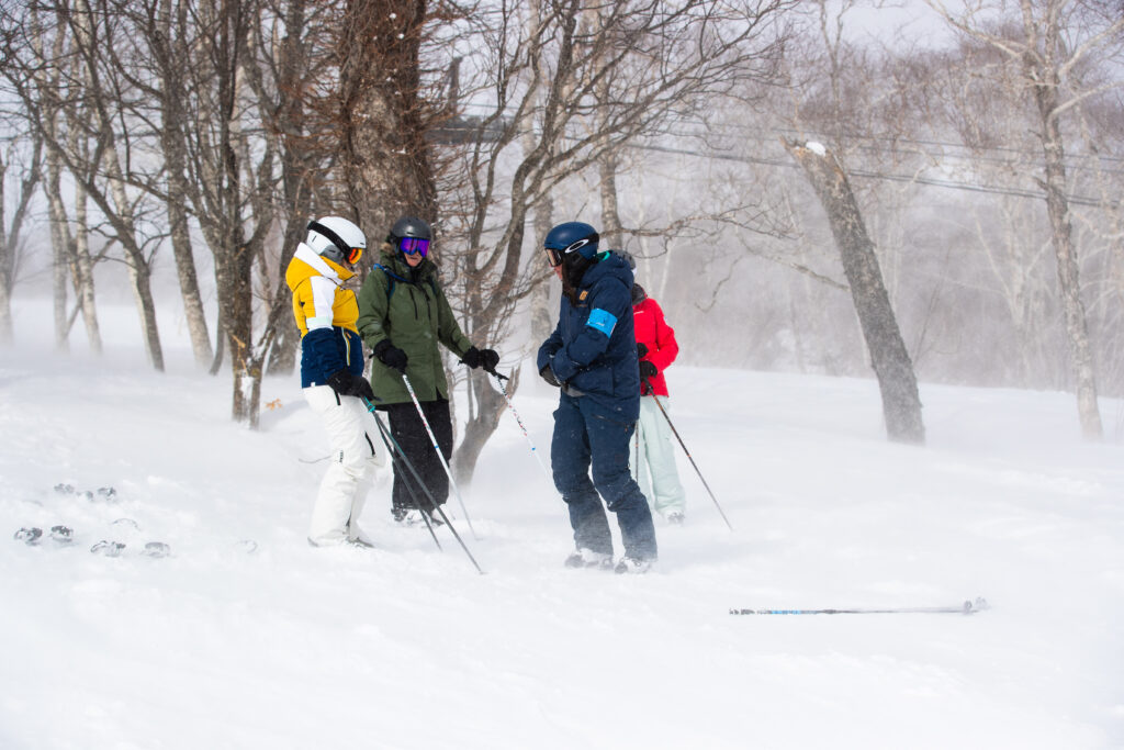Professional Photo of me coaching the ladies about carving