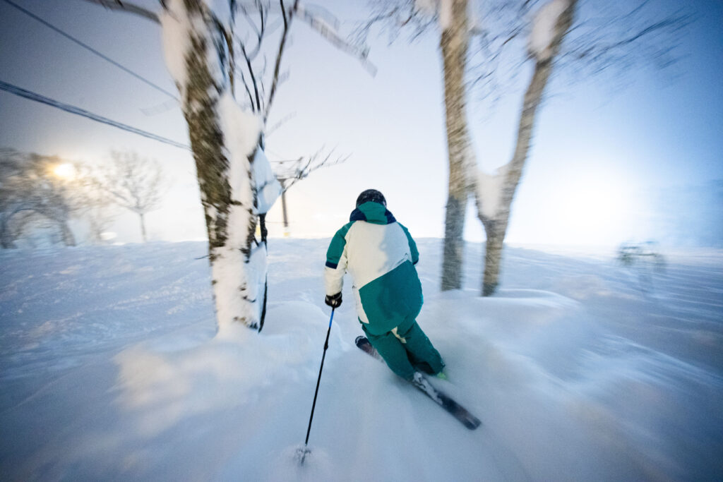 Women's ski holiday in Niseko, Japan featuring powder skiing during peak January snowfall.