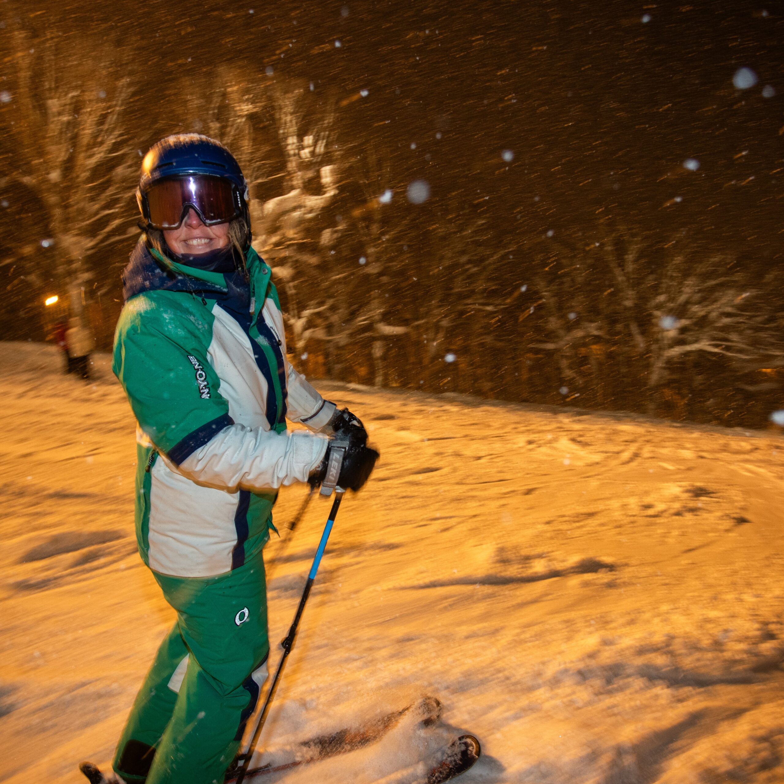 Night skiing in Niseko, Japan during fresh snowfall.