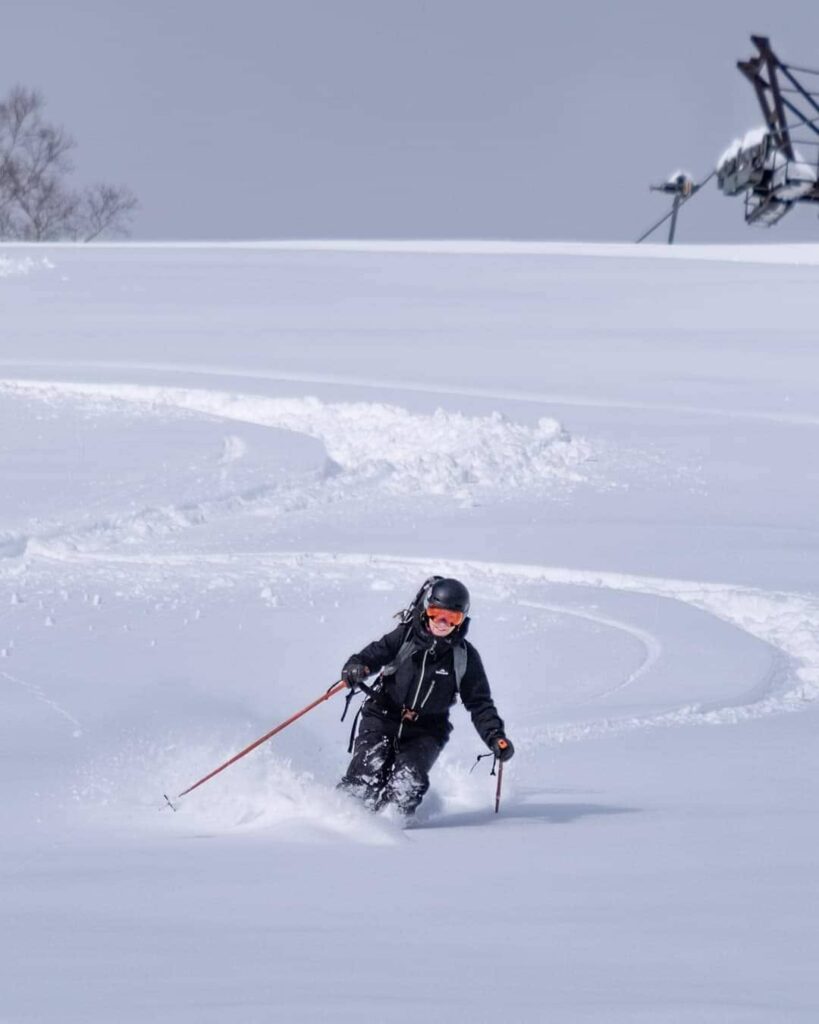 Tanya Hart skiing deep powder snow in Niseko, Japan