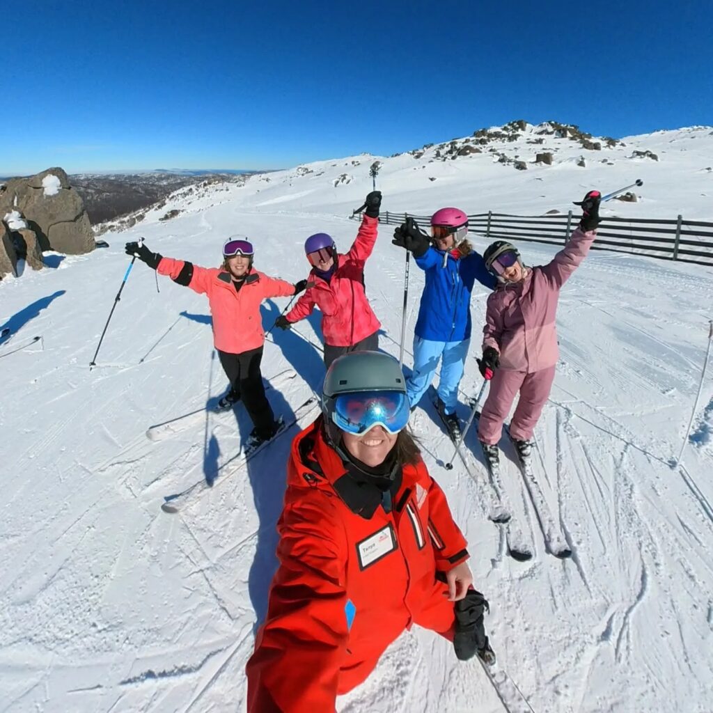 Tanya Hart leading a women's ski group at Thredbo, Australia