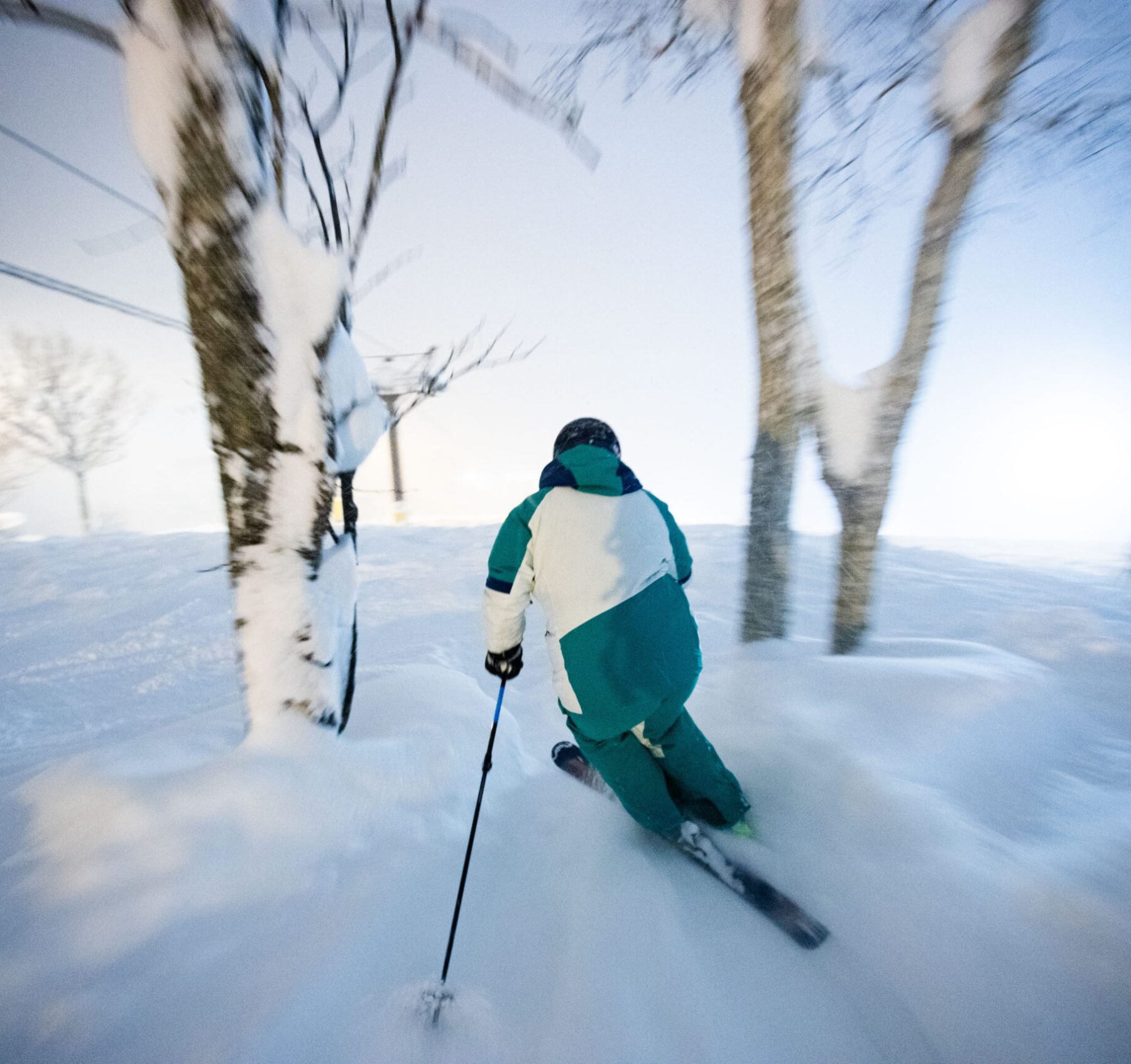 Women's ski holiday in Niseko, Japan featuring powder skiing during peak January snowfall.